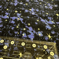 In Space Blue Galaxy Quilting Fabric by Elizabeth's Studio - Sold by the 1/2 Yard